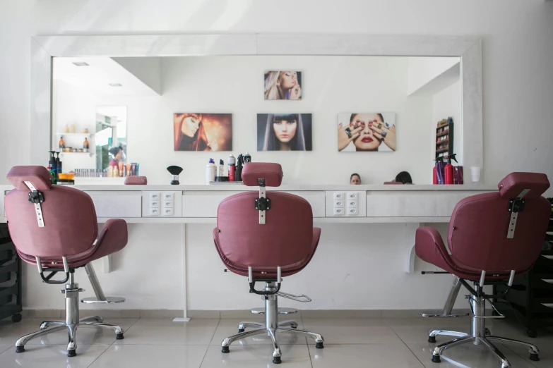 the chairs in front of the salon are empty