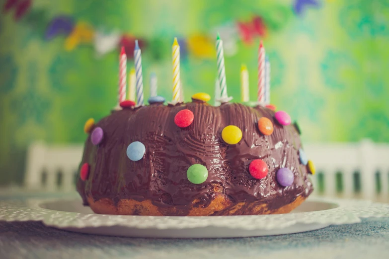 the chocolate cake has many candles on it