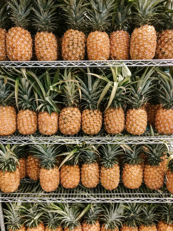 a shelf filled with lots of different kinds of pineapple