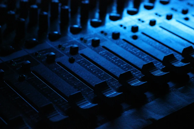 dark blue pograph of sound mixing mixer ons