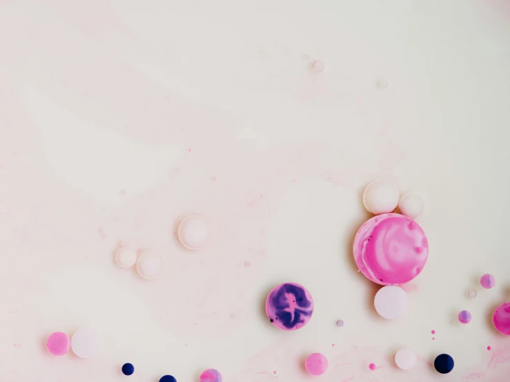 bubbles with a pink on on a white background