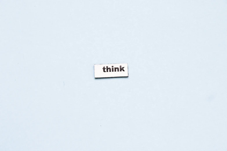a piece of paper that says think above the word think