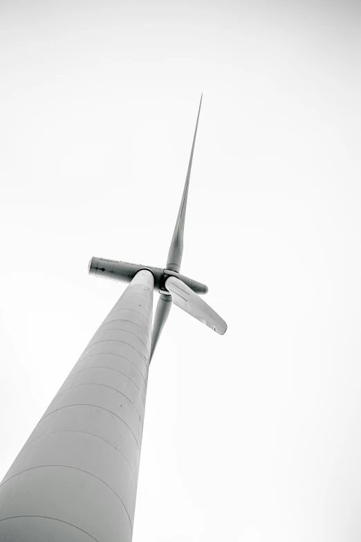 a view from the bottom up of a windmill that looks upward