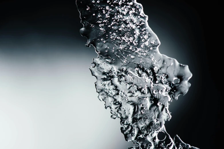 water splashing up on itself in the air