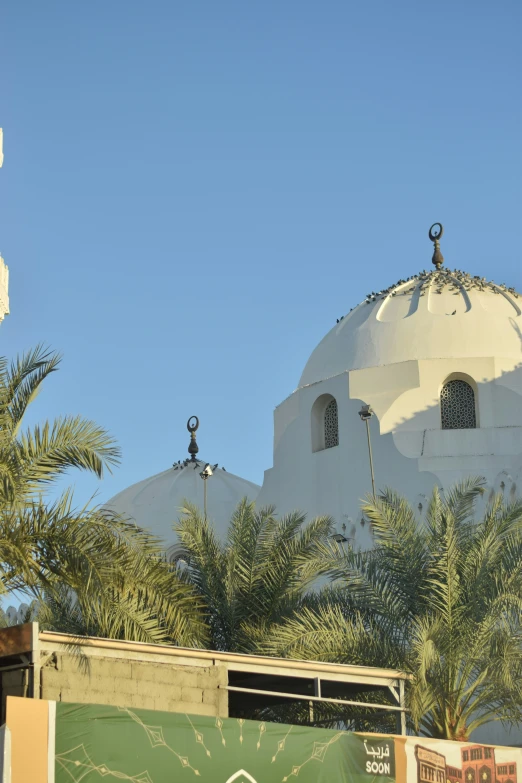 a white church with a clock on top