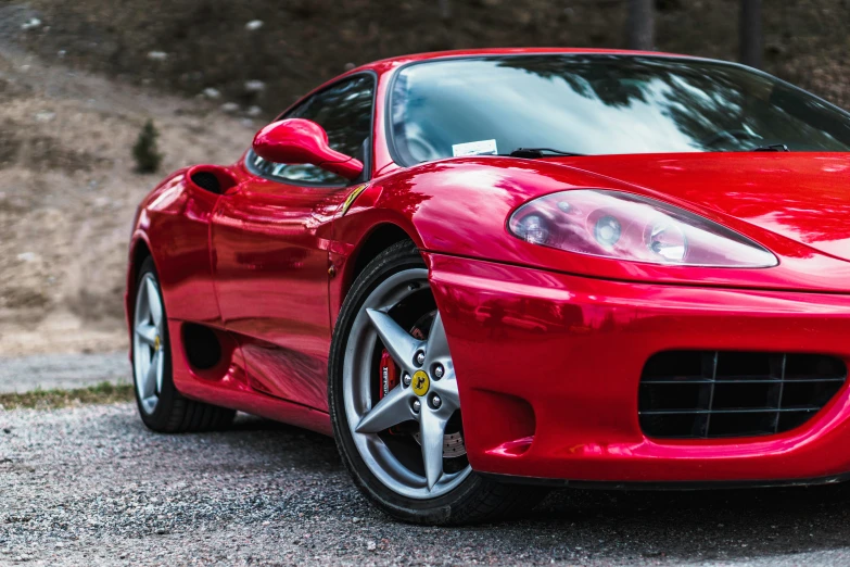 this is the front end of a red sports car