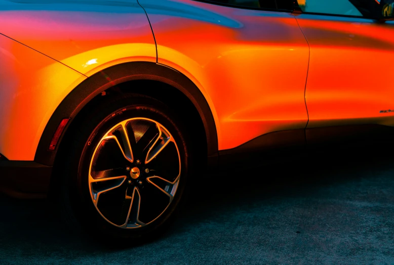 a car is shown that appears to be painted orange