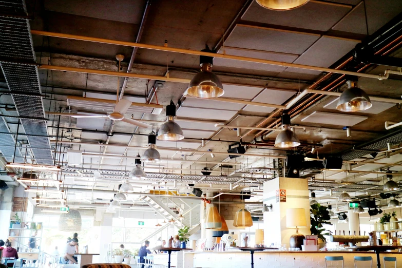 people are eating at a table in a restaurant