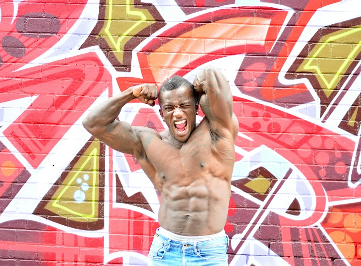 a man is posing for a picture with his shirt on