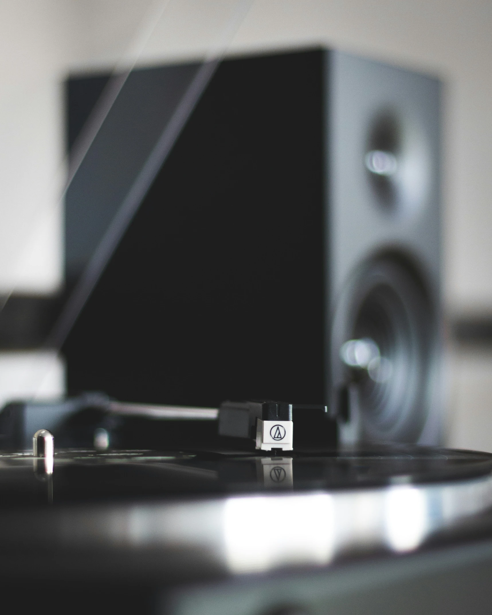 a record player sits in front of the sound board