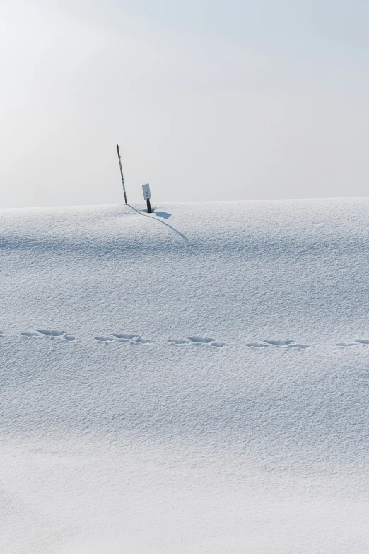 a lone person on skis in an open water area