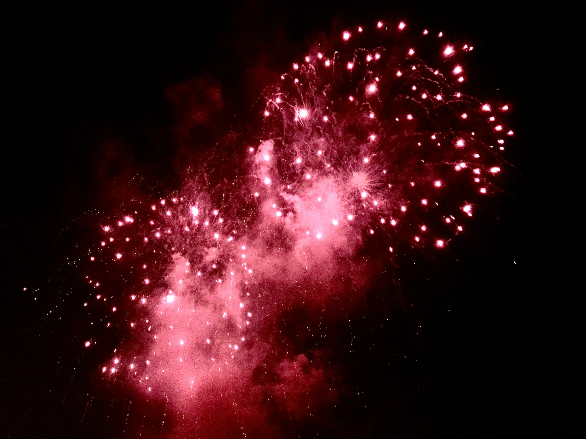 a very pretty fireworks that is bright in the night sky