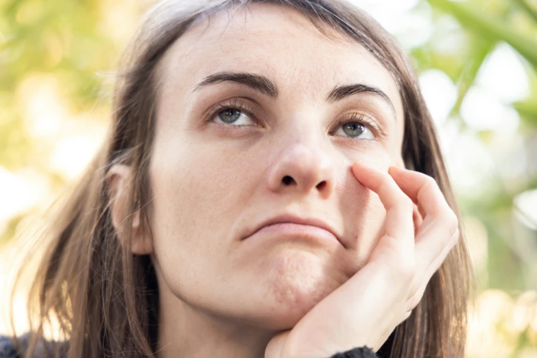 a woman is staring intently to her right