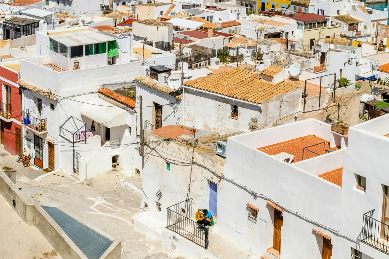 the roofs of many houses in an urban setting