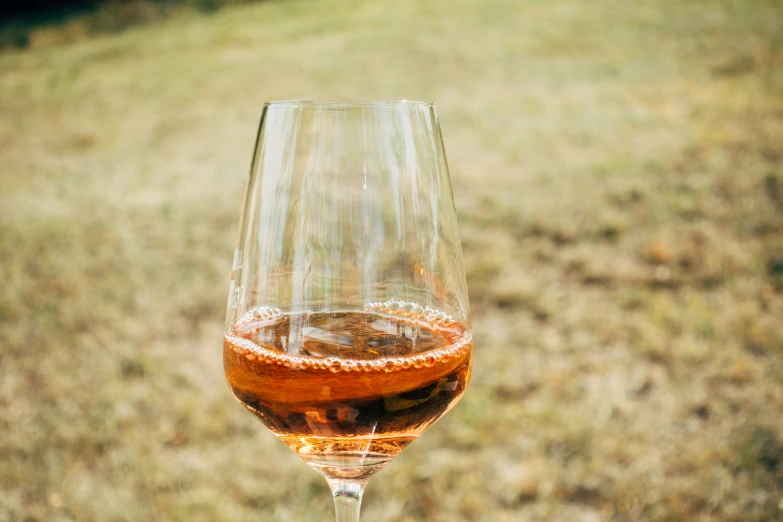 an up close image of a glass of wine