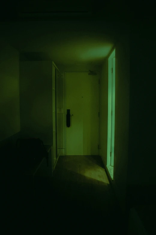 a door open in a dimly lit room