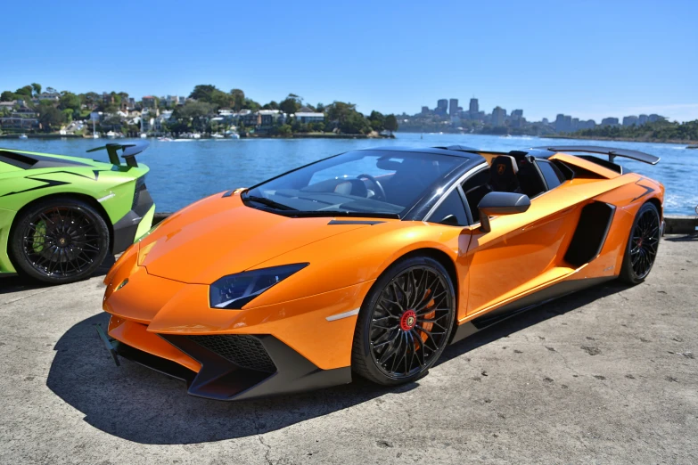 two different colored vehicles parked side by side