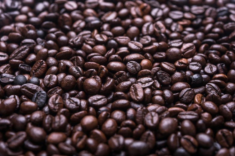 some kind of close up view of many coffee beans