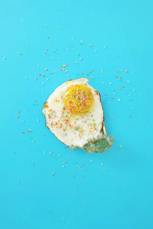 an egg on toast with confetti sprinkles