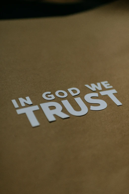 a sticker that says in god we trust on it