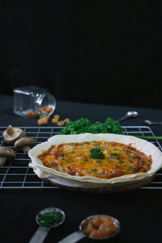 a dish of food on a black surface