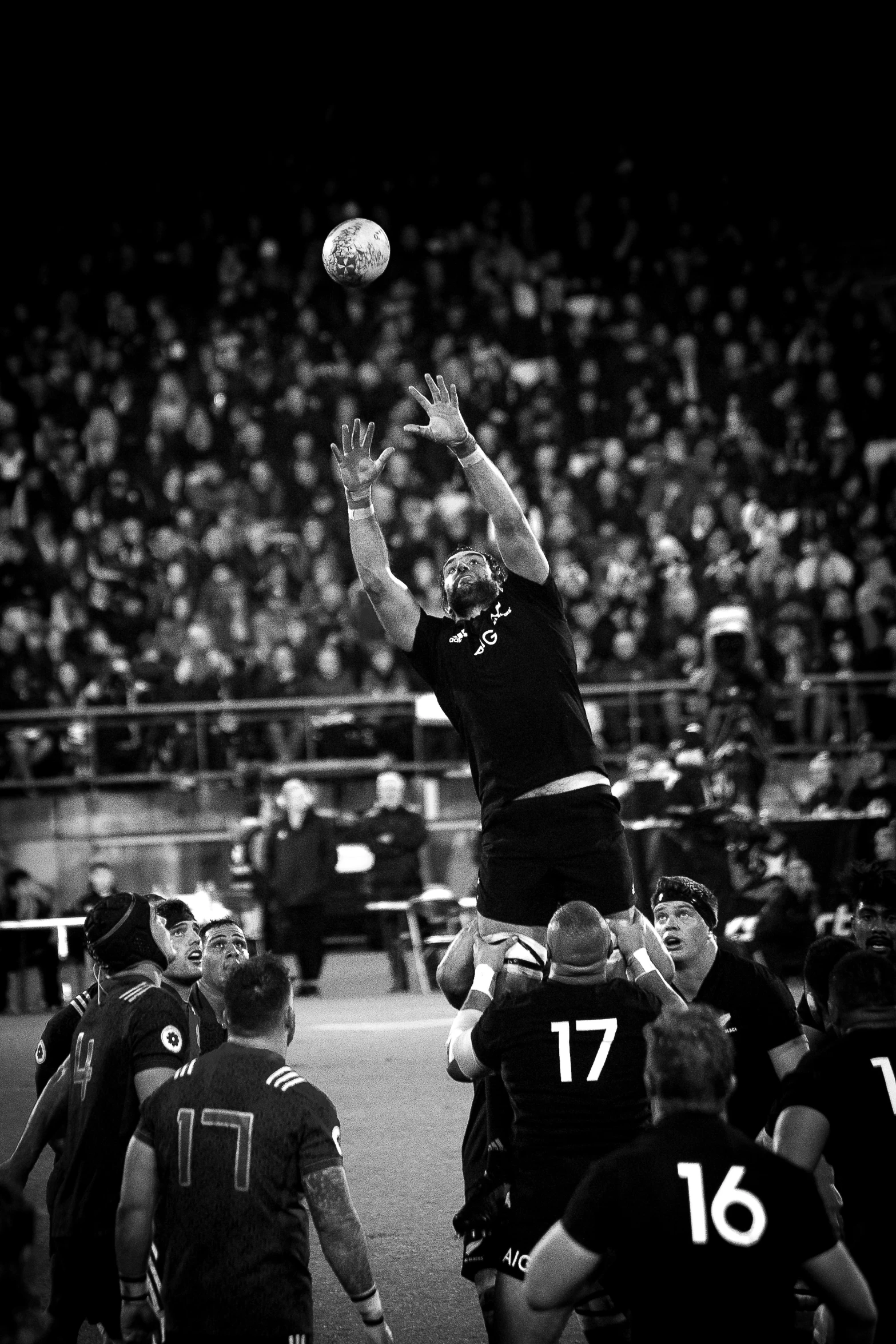 a man jumping in the air to catch a ball