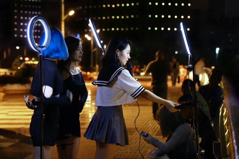 two people dressed up with lights attached to their heads