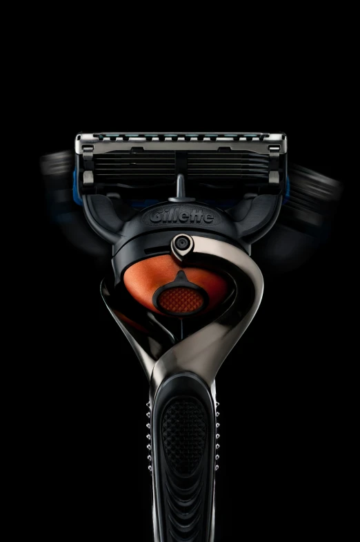 a view of a new electric shaver in the dark