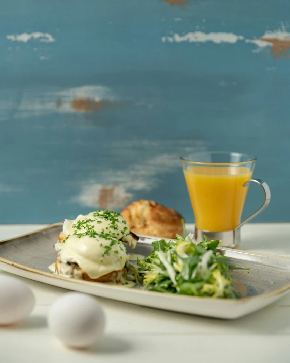 a plate full of food with egg and bread on it