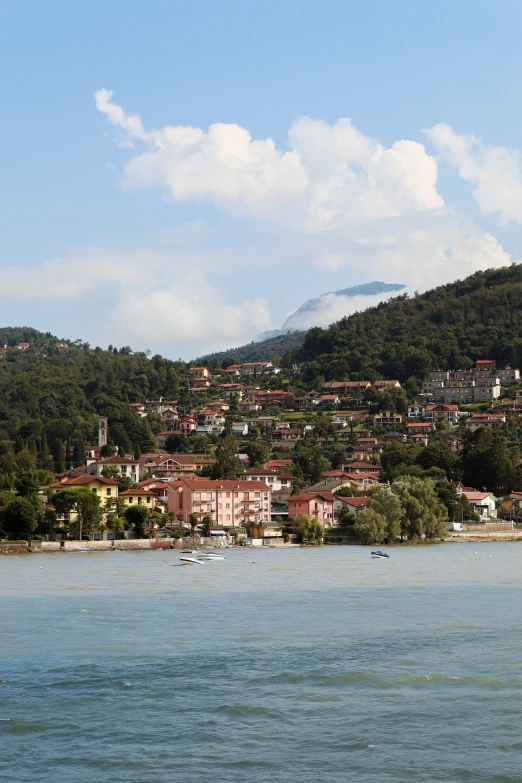 a body of water with boats on it and buildings on top