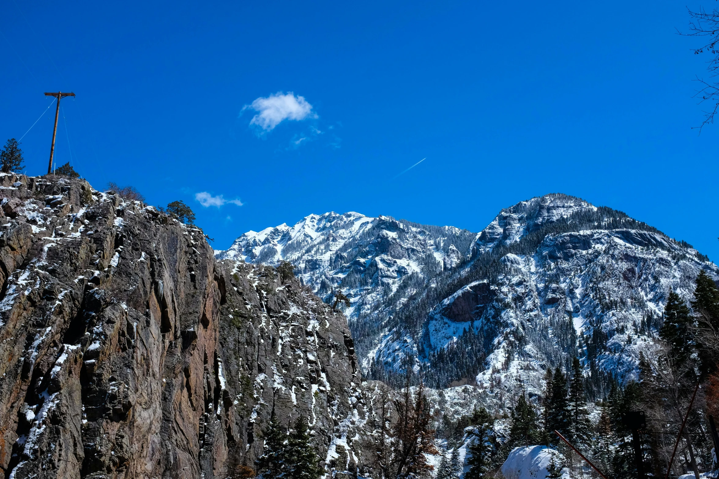 some mountains that are covered in snow in the snow