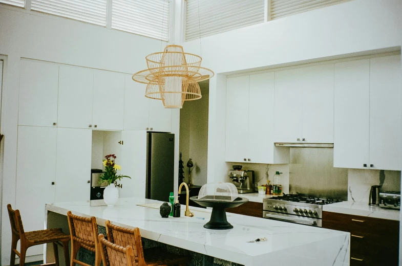 an elegant kitchen with an island style counter top