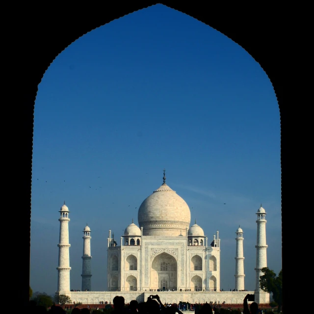 view from doorway on white marble architecture with arches in foreground