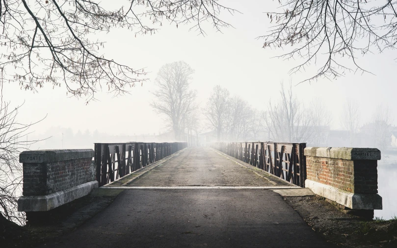 there is a large bridge over a lake