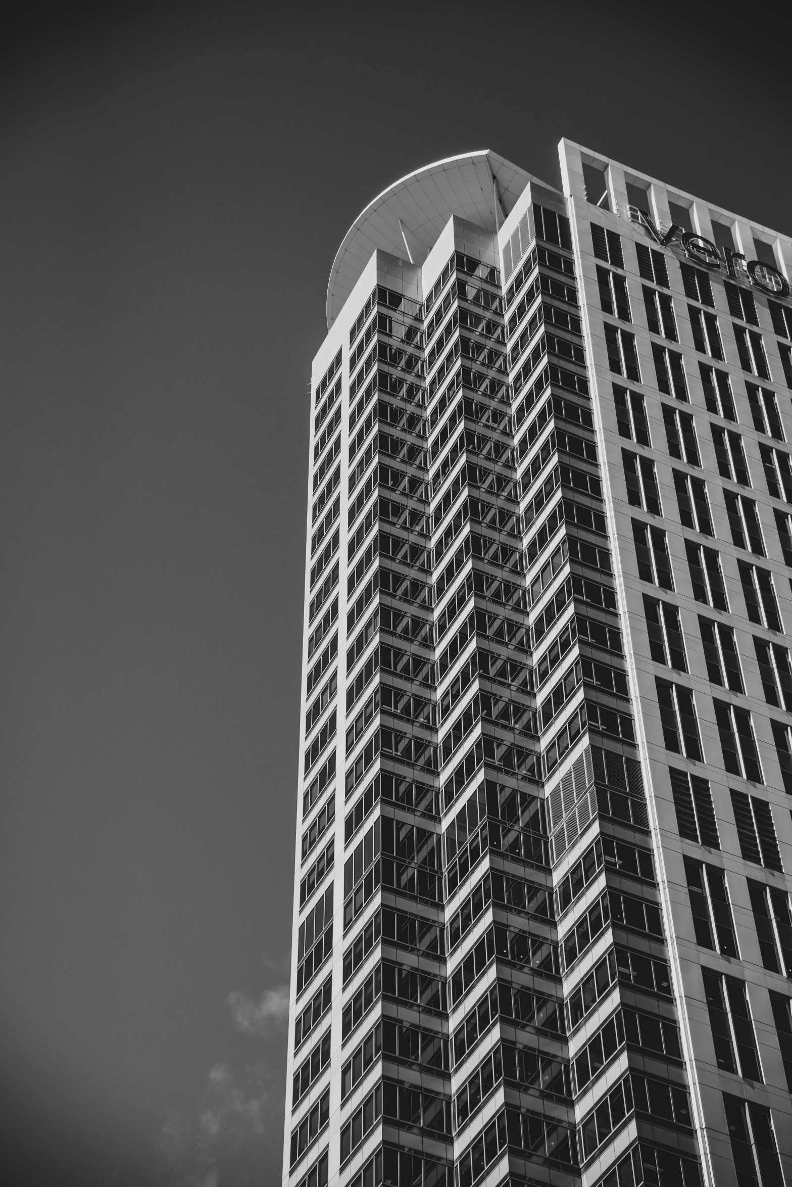 a tall building sitting next to a street light