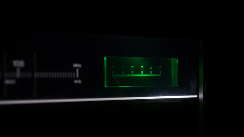 a microwave oven that has a green light on