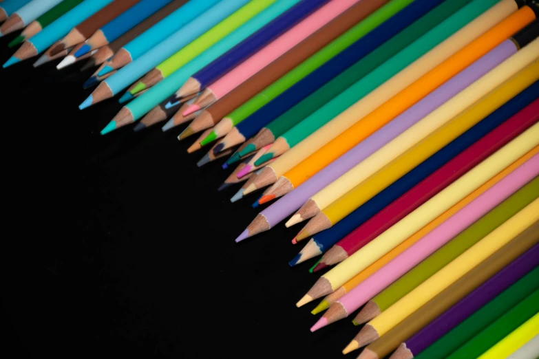 the long and colorful pencils are lined up