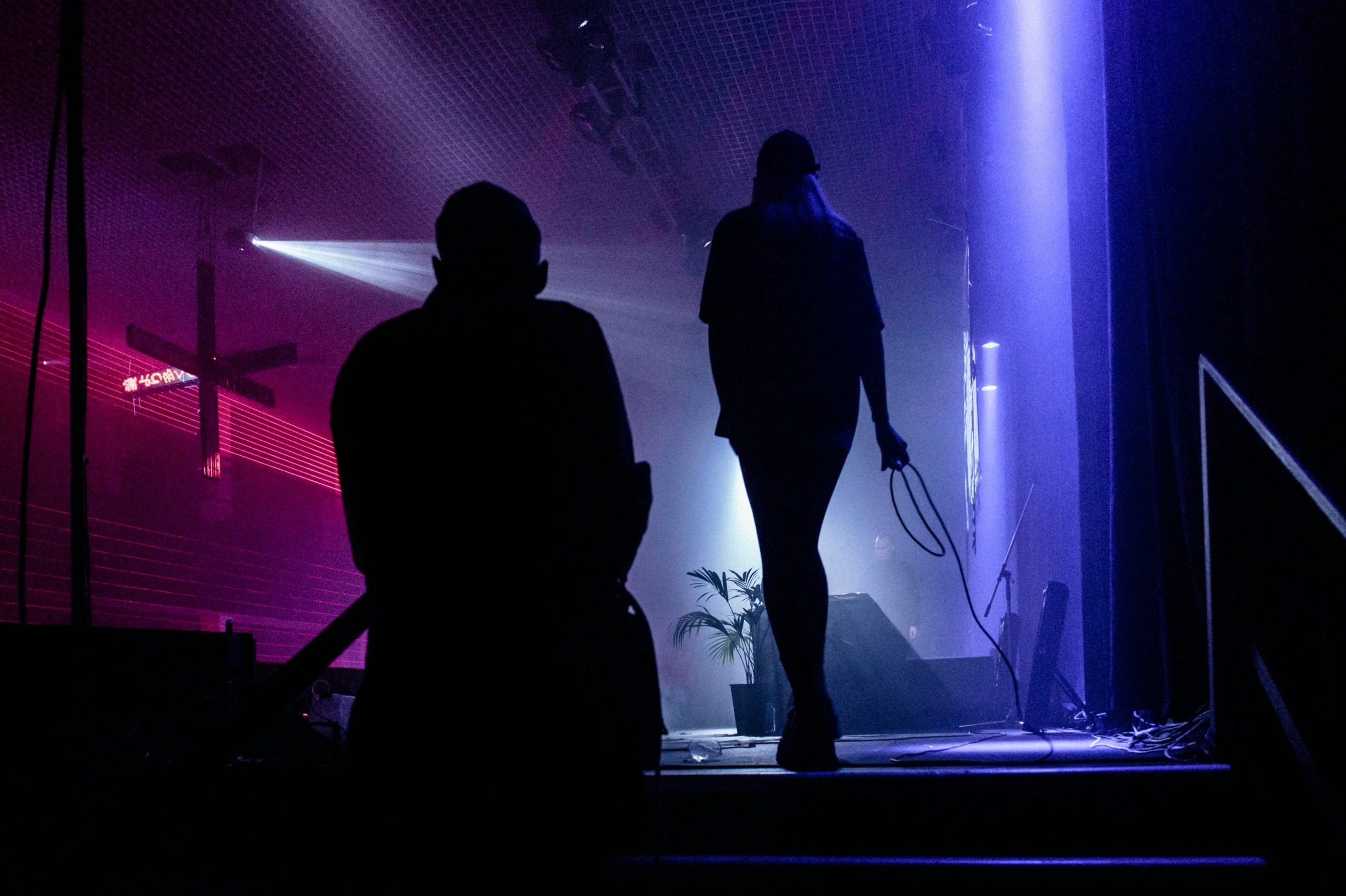 a man that is standing up with a microphone in his hands