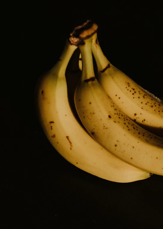 some bananas that are still ripe and unripe