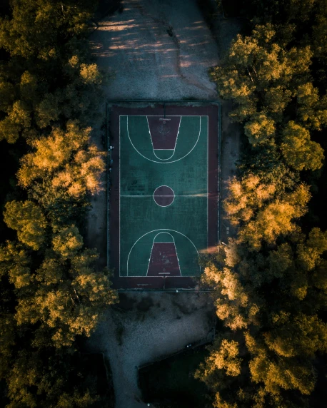 an overhead view of a basketball court with a basketball court next to it