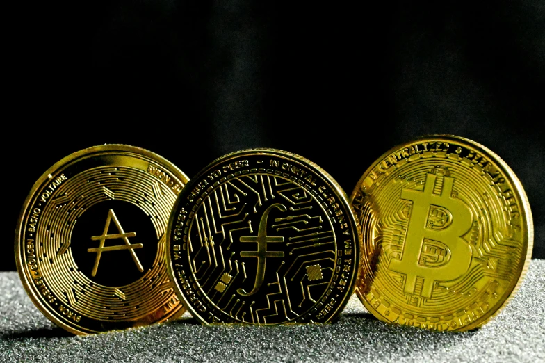 three bitcoins on top of each other