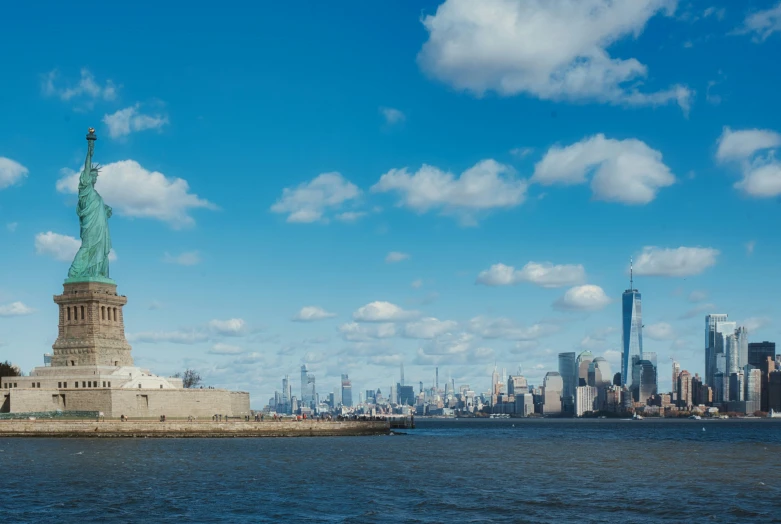 the statue of liberty is in the middle of the water