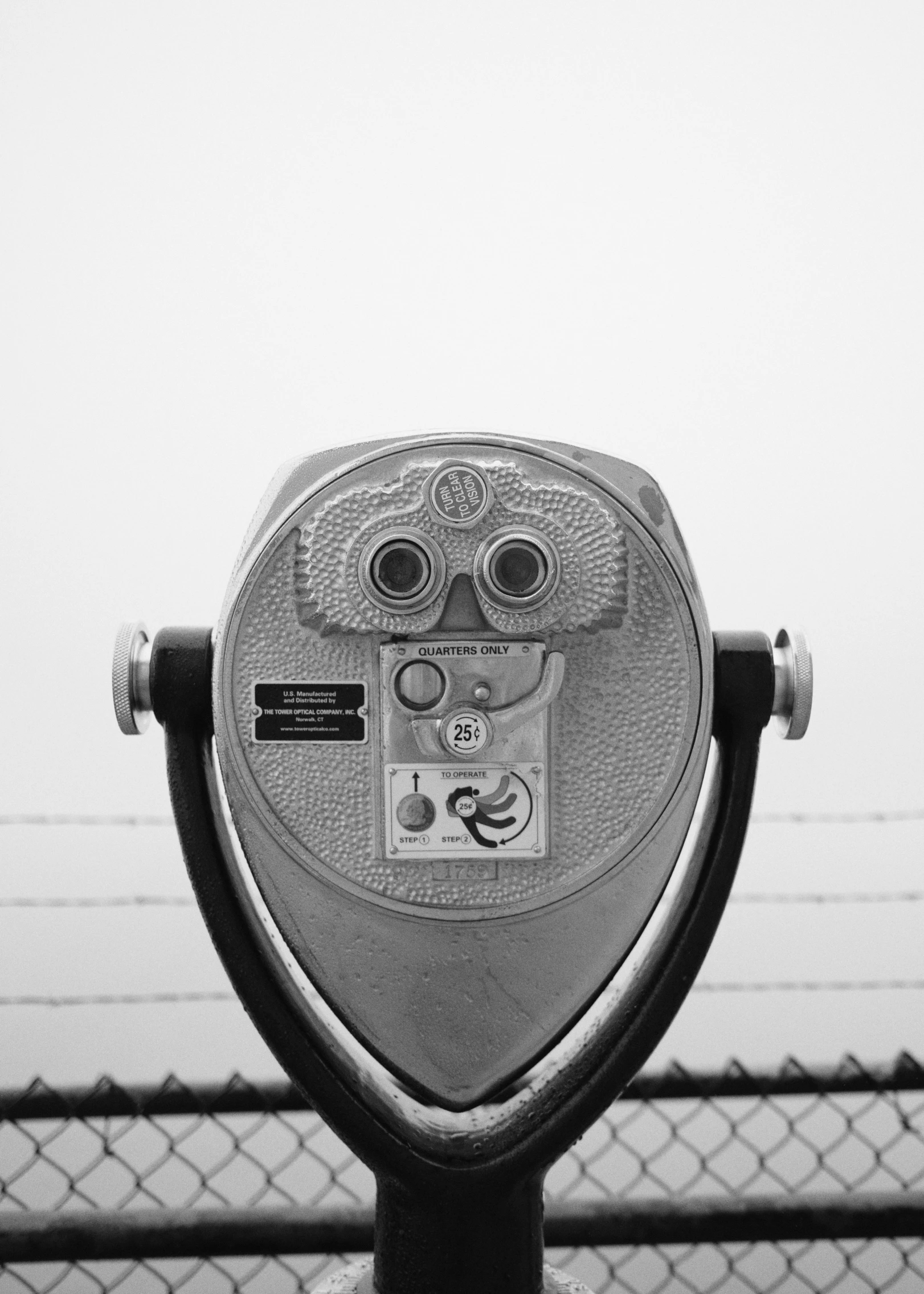 the back end of a meter is marked with three circles and an image on it