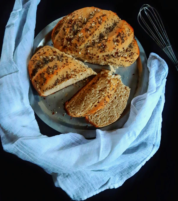 sliced loafs of bread on top of a metal pan