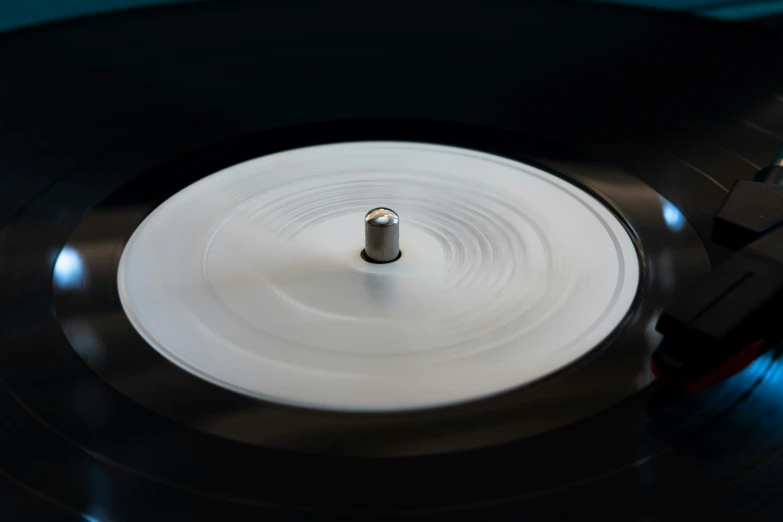 a record player playing on a record in a room