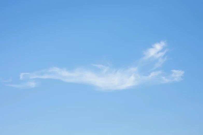 this is an image of a plane flying high up in the sky