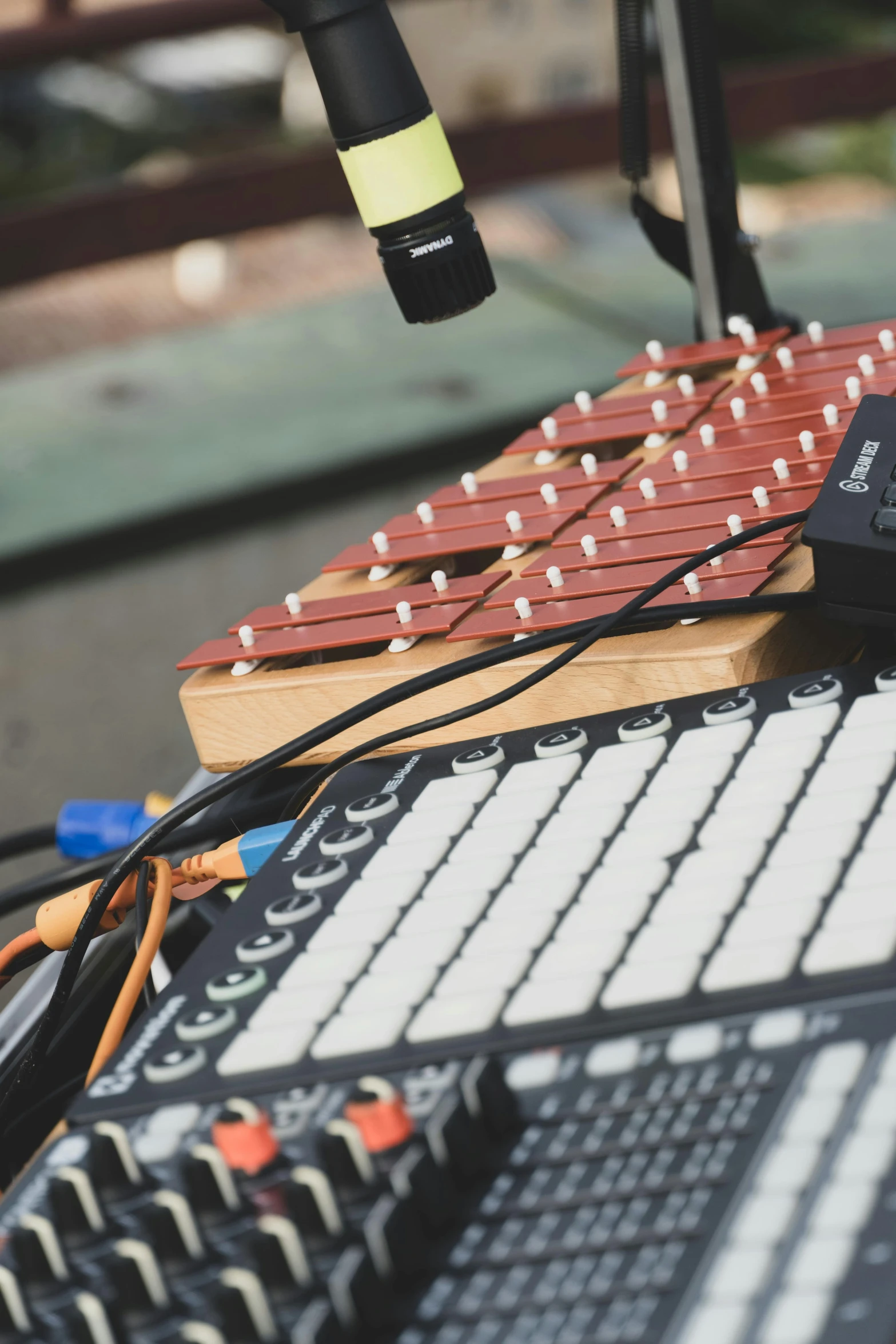 a soundboard next to an old microphone and some other equipment