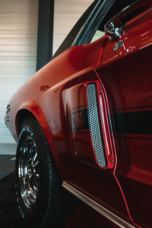 the front side of a car with chrome trim