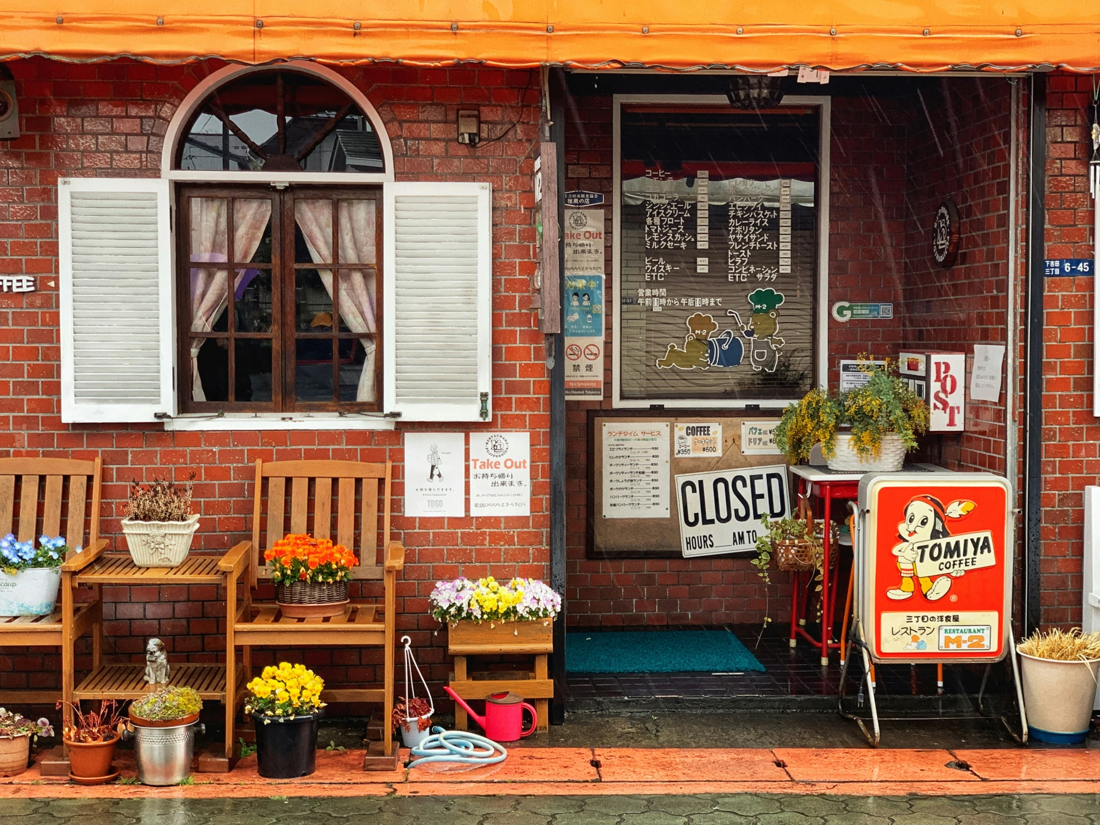 a small restaurant selling flowers and sushi