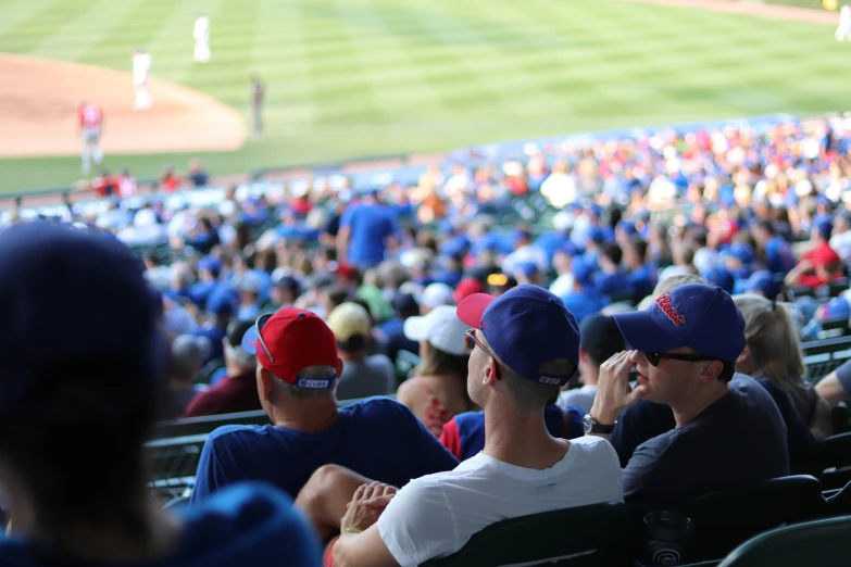 a bunch of baseball players in the stands